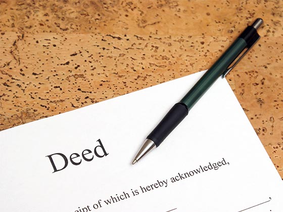 Image of Deed and pen